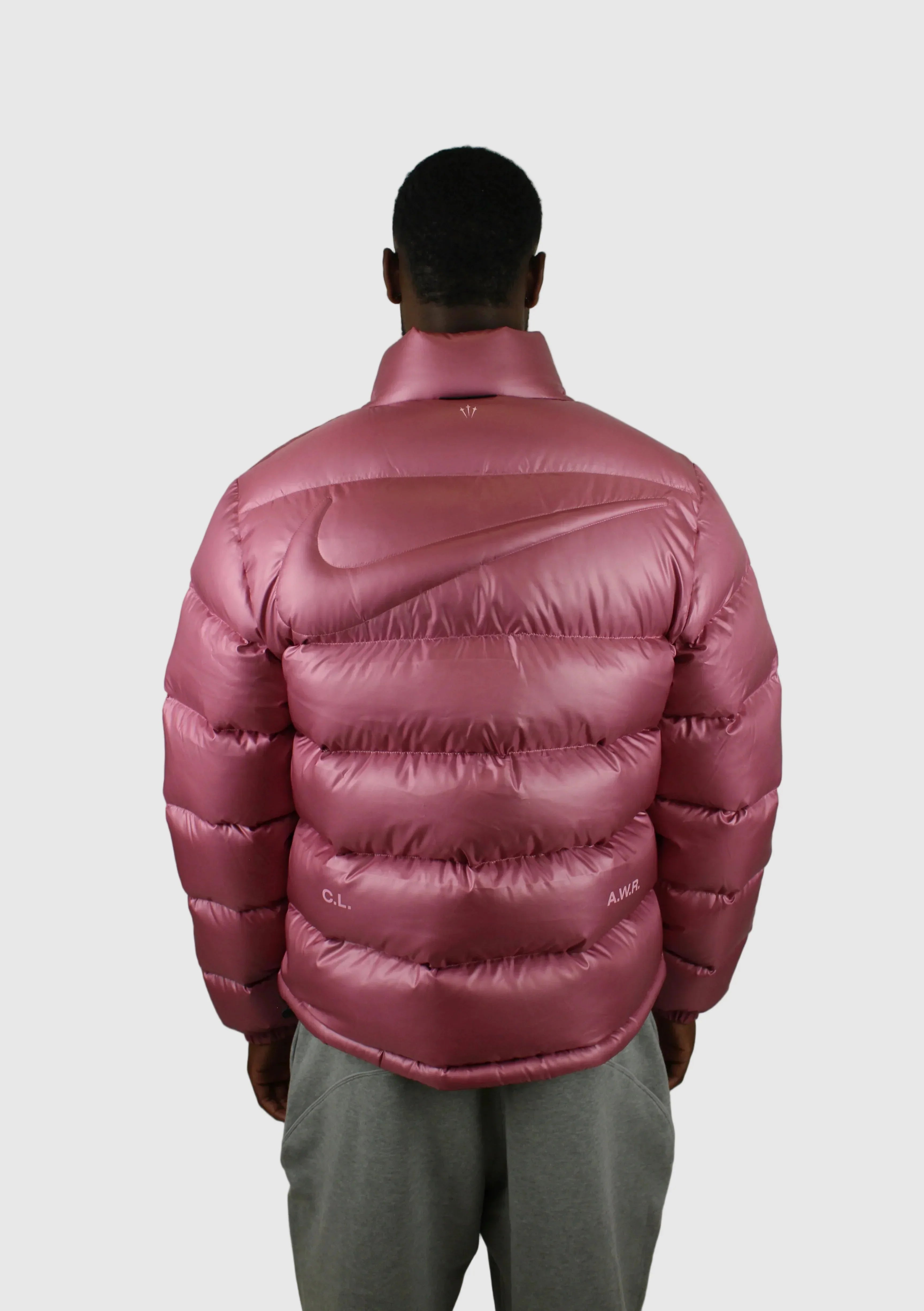NOCTA x Drake Puffer Jacket Pink