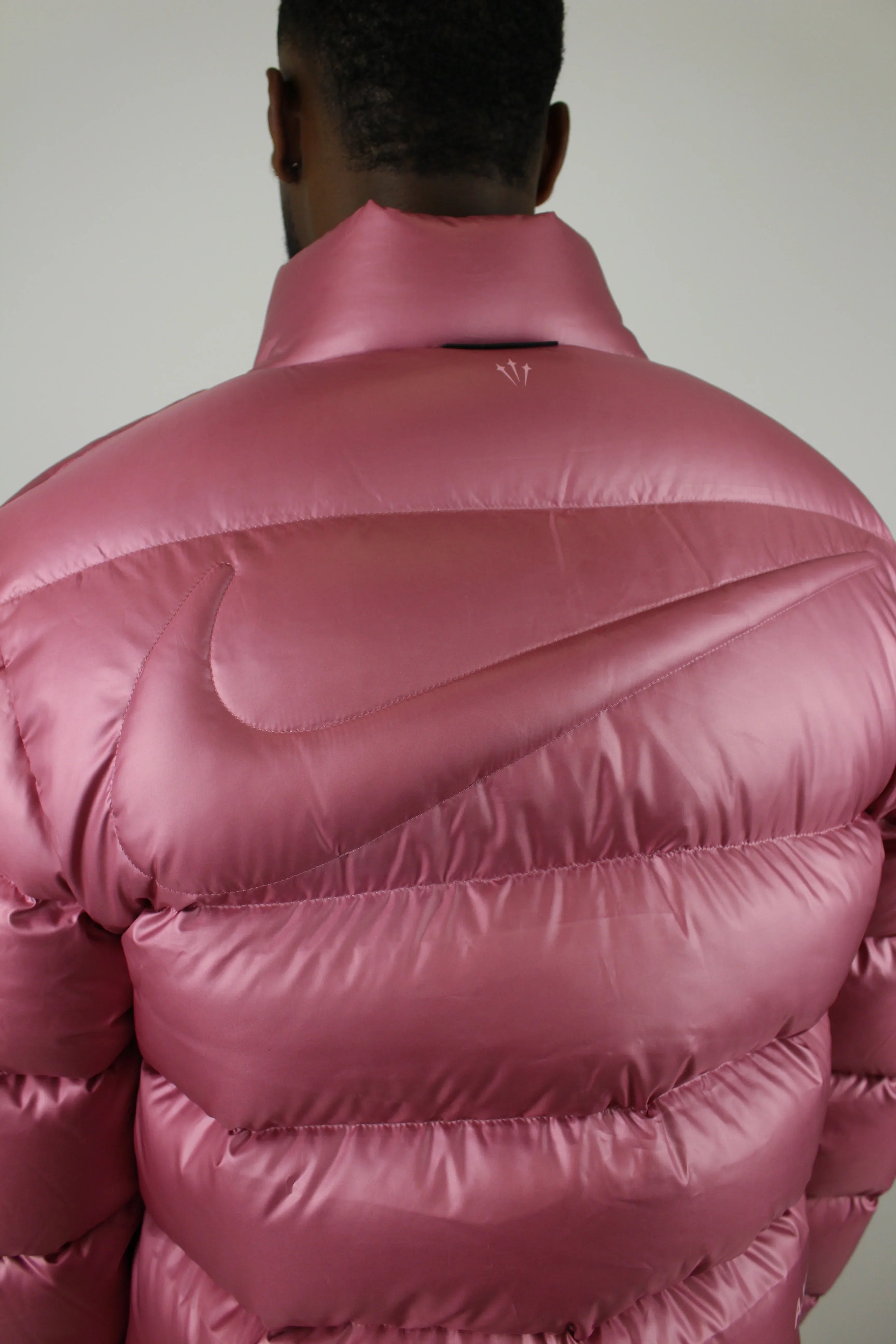 NOCTA x Drake Puffer Jacket Pink
